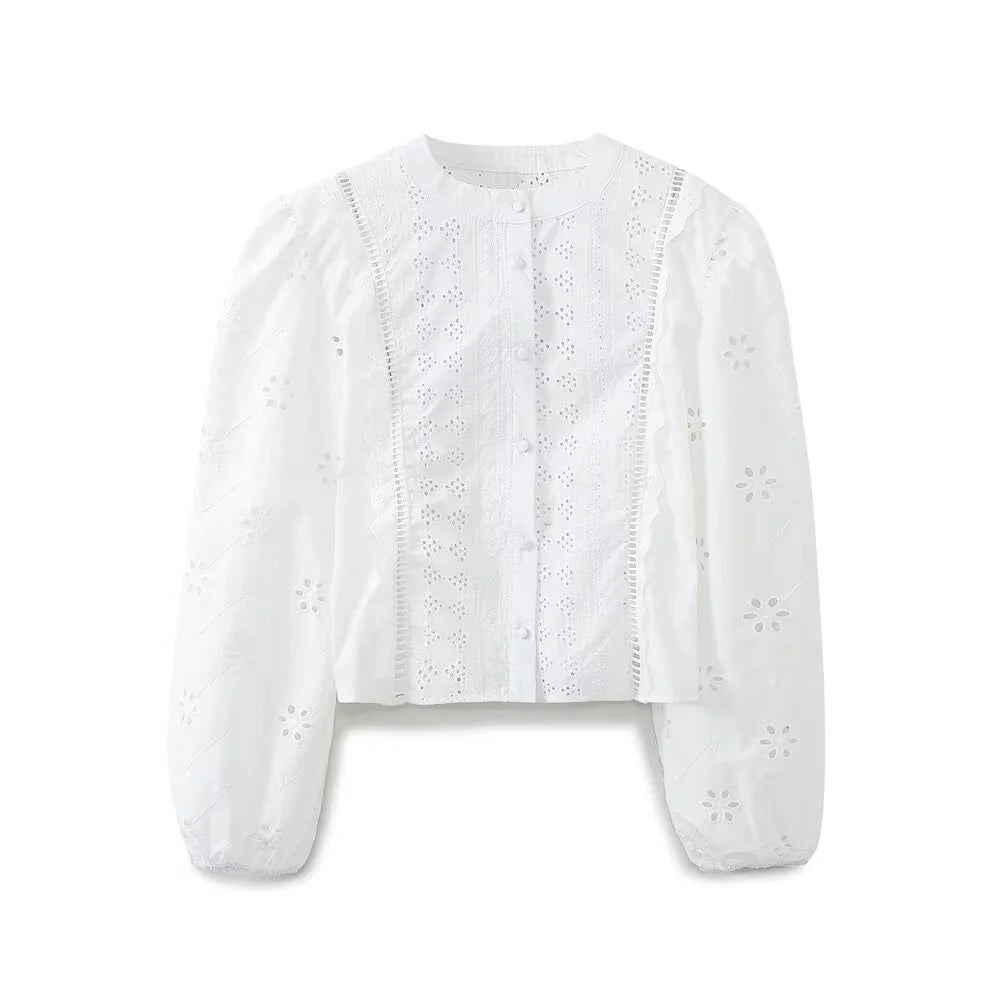 Elevate your wardrobe with Zach Ailsa's Women’s Single Breasted Round Neck Lantern Sleeve Embroidered Hollow Shirt, stylish and slimming.