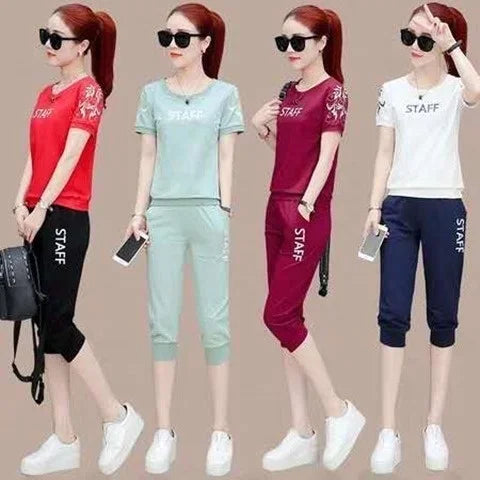 Discover stylish versatility with the Women's Summer Casual Two Piece Sports Set Plus Size Short Sleeve Crop Top and Capri Pants.