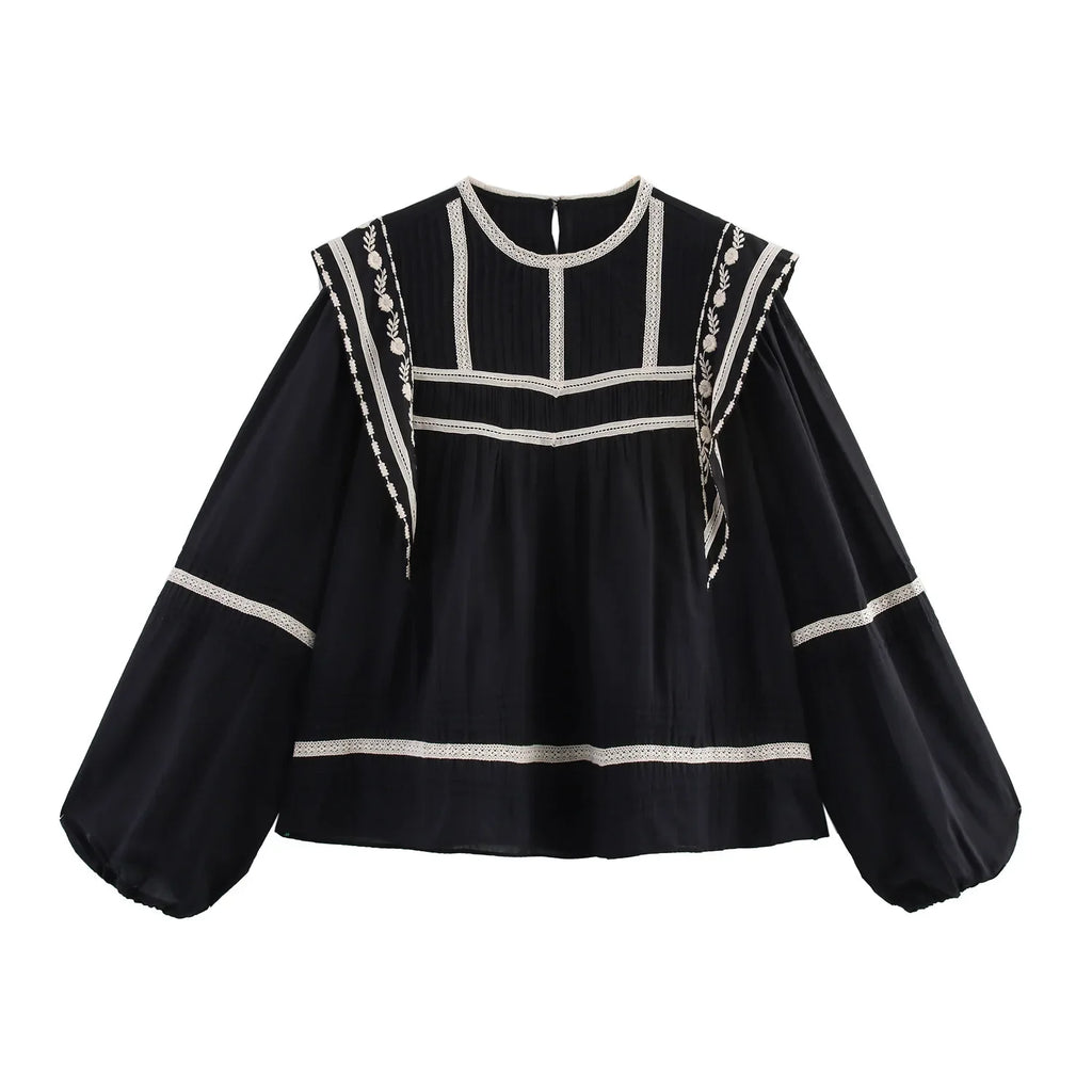 Stylish ZBZA Women's Contrasting Color Embroidered Shirt with Round Neck Puff Sleeves and Loose Hem, perfect for spring and summer.