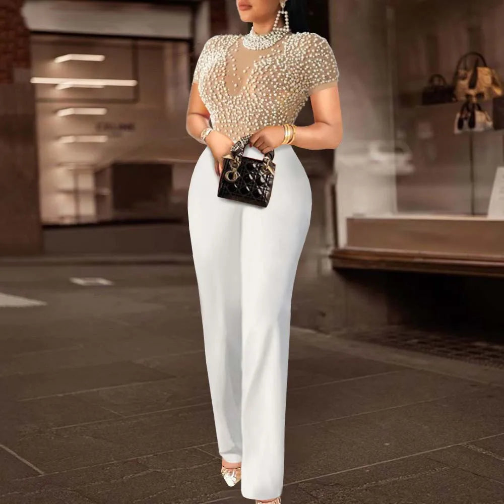 Sophisticated and chic, the Elegant High Waisted Beaded Short Sleeve Jumpsuit for Women enhances luxury birthday dinner parties.