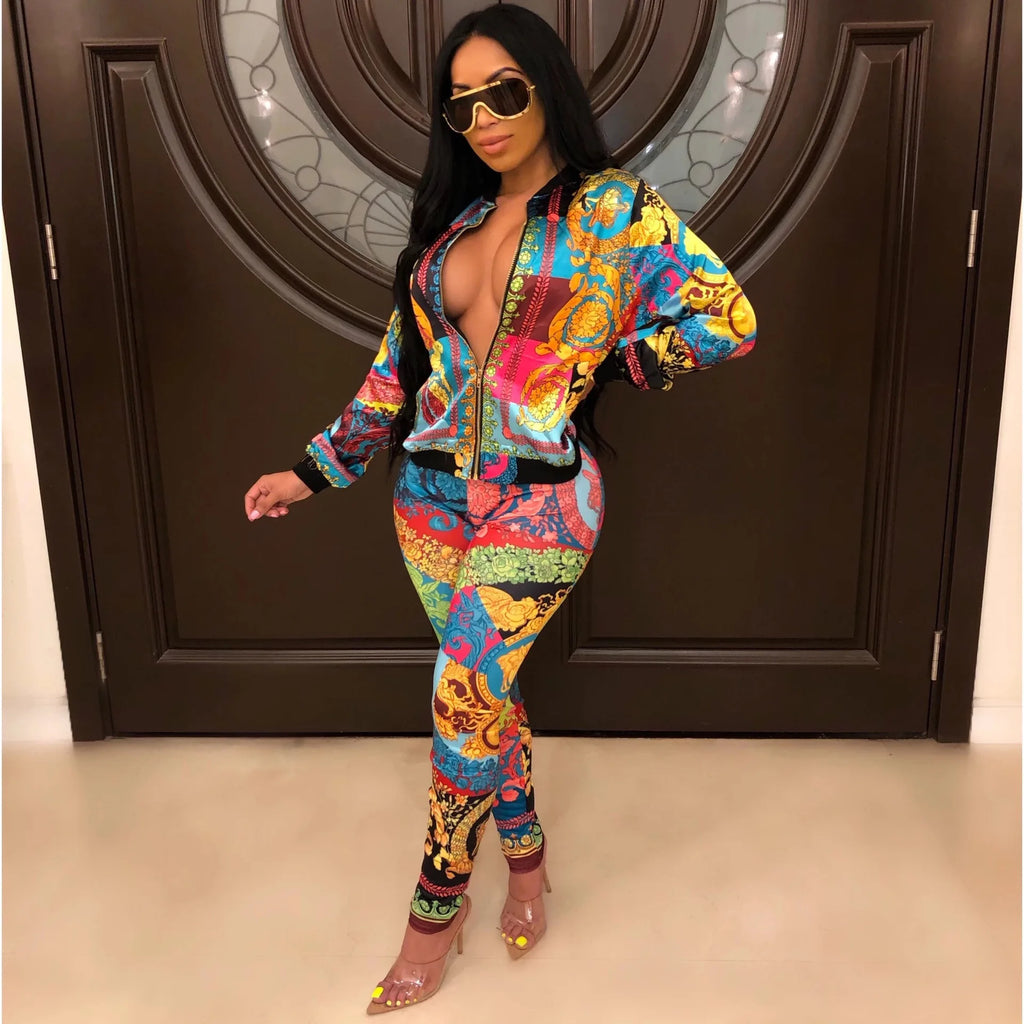 Stylish Two Piece Women's Sweat Suit with Full Sleeve Zipper Top and Sporting Pants, perfect for casual outings or gym.