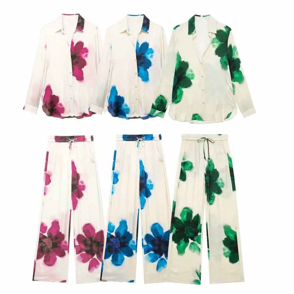 Shop the Women's Autumn Casual Loose Collar Printed Long Sleeve Shirt and High Waist Wide Leg Pants Set in vibrant colors.