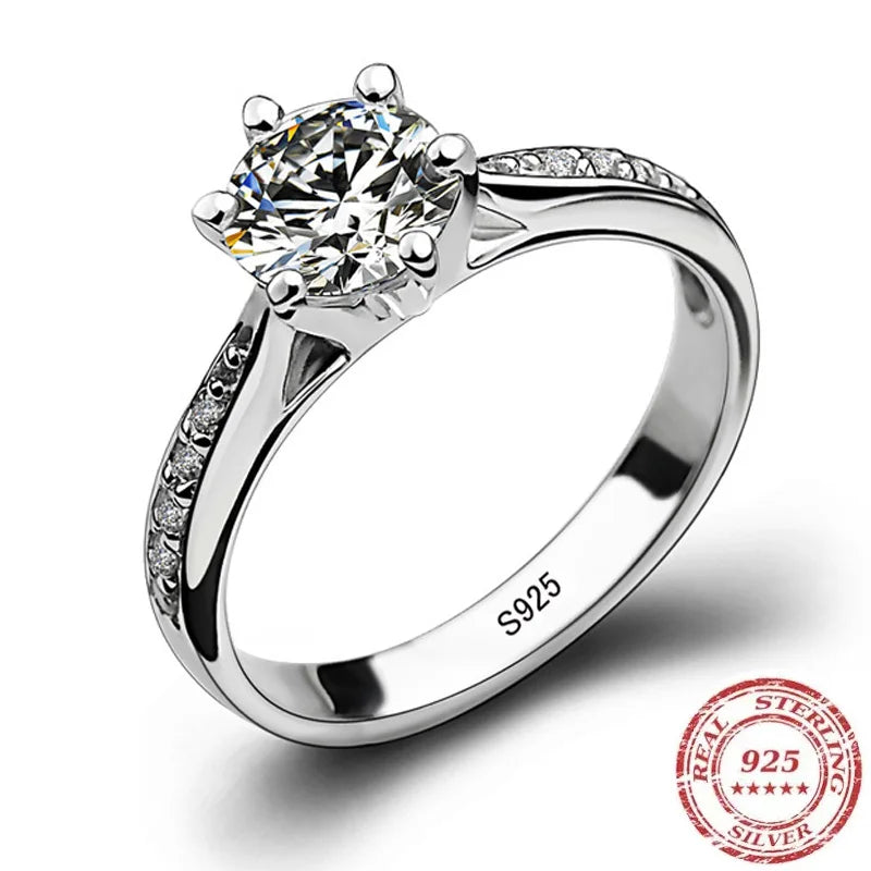 Luxury 925 Sterling Silver Classic Six Claw Diamond Engagement Ring for Women showcases timeless elegance and brilliance.