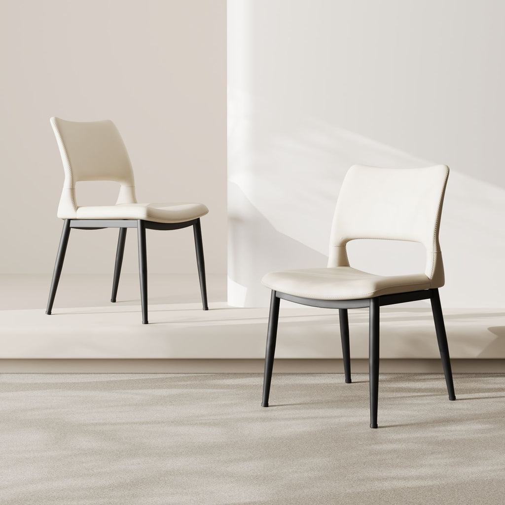 Modern minimalist white PU leather Dining Chairs Set of 2, comfortable backrest design, metal leg support, suitable for restaurants, kitchens, and offices.