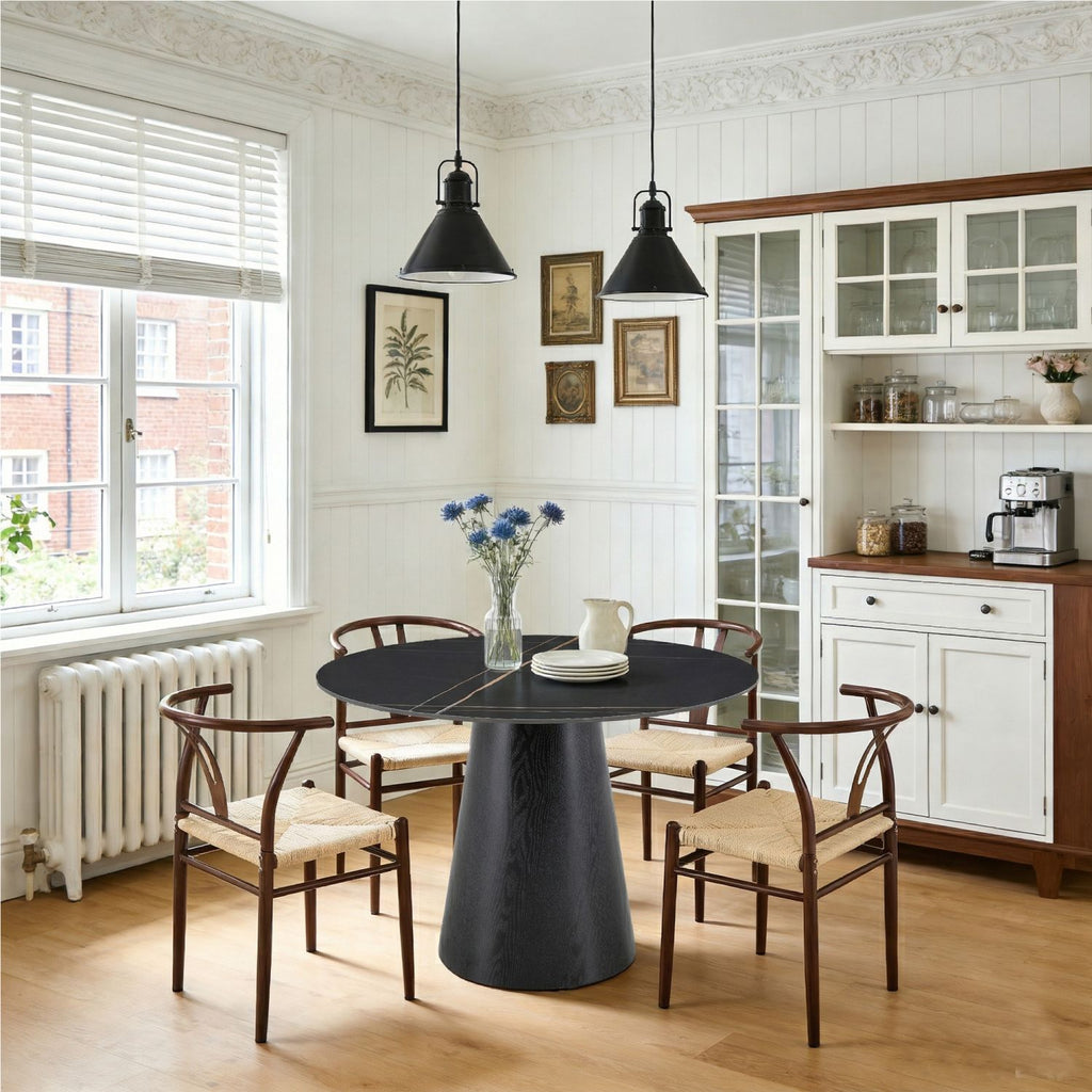Table and chair set. A 42 inch rock slab round table, paired with four uniquely designed dining chairs with walnut coloer metal legs. The table legs are made of black density board material.