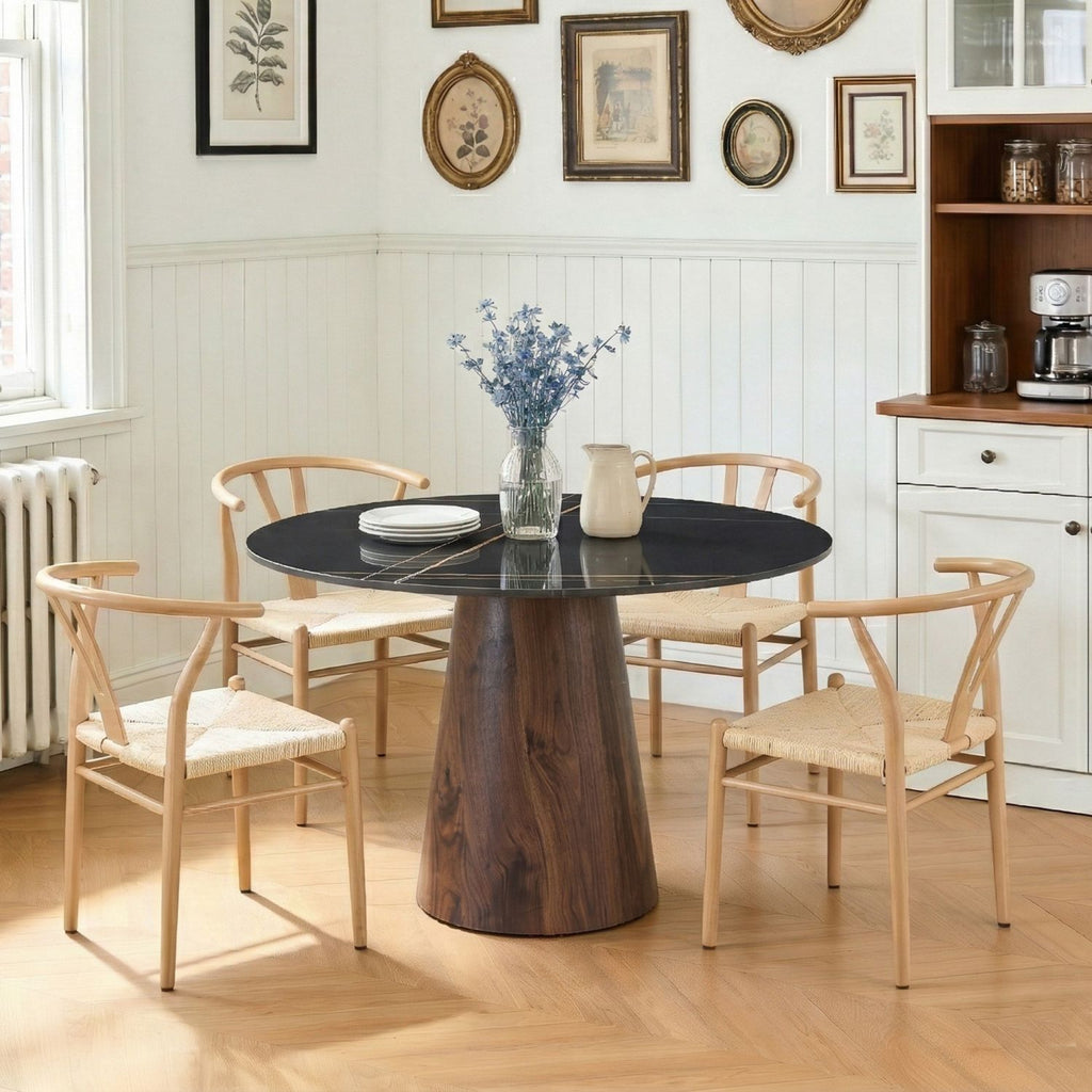 Table and chair set. A 42 inch rock slab round table, paired with four uniquely designed dining chairs with wood coloer metal legs. The table legs are made of walnut density board material.