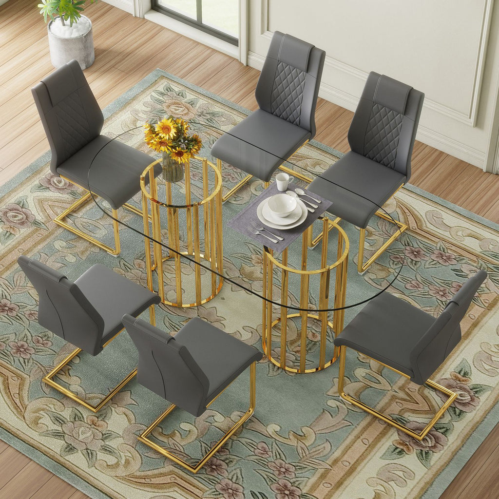 Table and chair set.71 inch oval tempered glass dining table,gold double column light luxury style,Dark Gray High-quality PU Chairs With Golden Arched Metal Legs,Modern Table & 6 Seater Furniture Set.