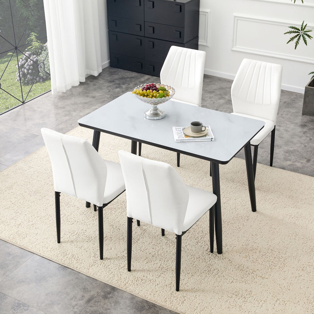 Table and Chair Set.Modern dining table. White imitation marble texture glass top + lower black MDF board,black metal legs.Paired with 4 White Dining Chairs, 37 inches High, Ergonomic PU Backrest.