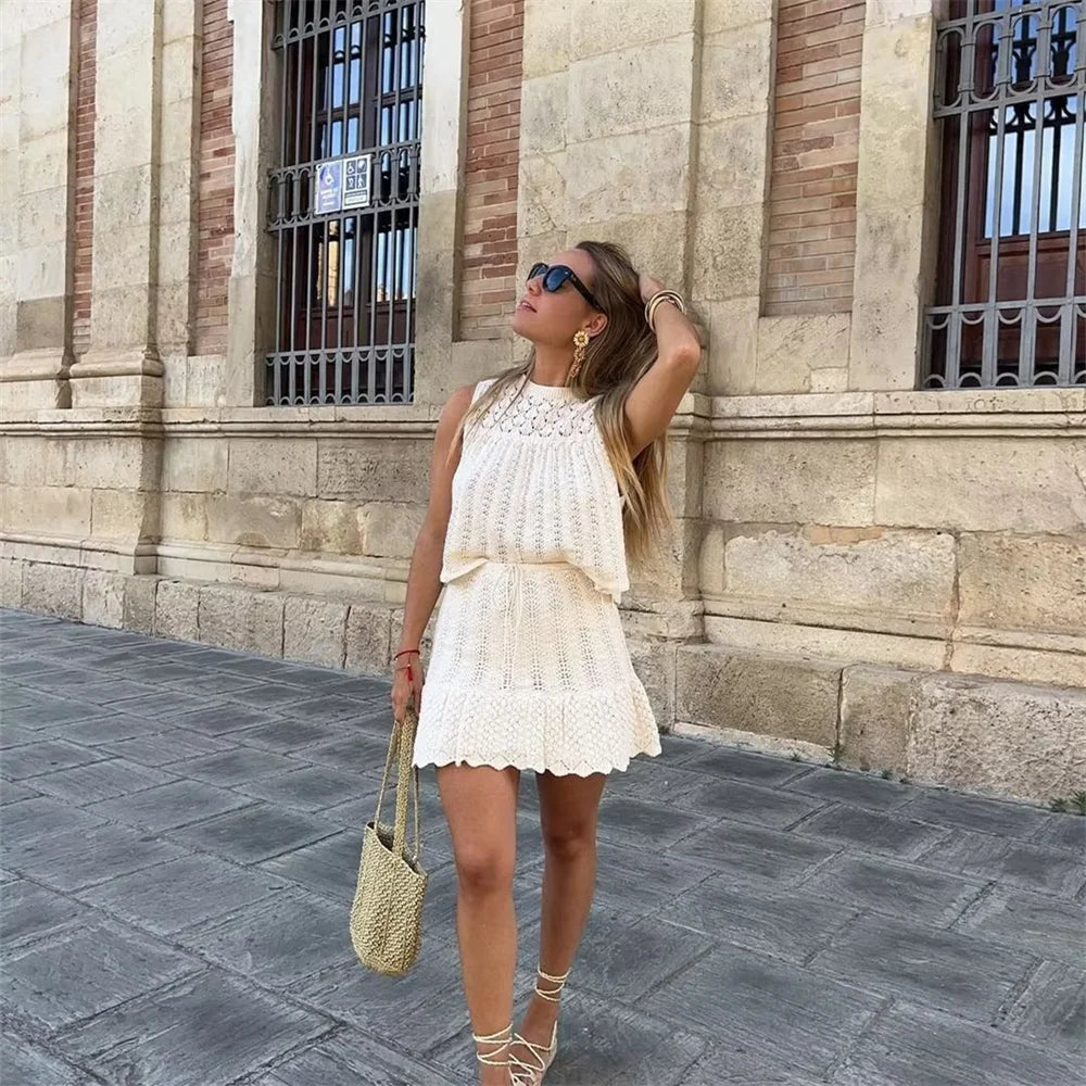 Women’s Fashion Jacquard Hollow-Out Knitted Crop Top and Mini Skirt Set Stylish Slim Fit Two-Piece Outfit for Casual and Office Wear